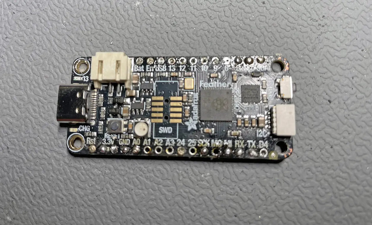 Feather RP2040 desoldering pin headers