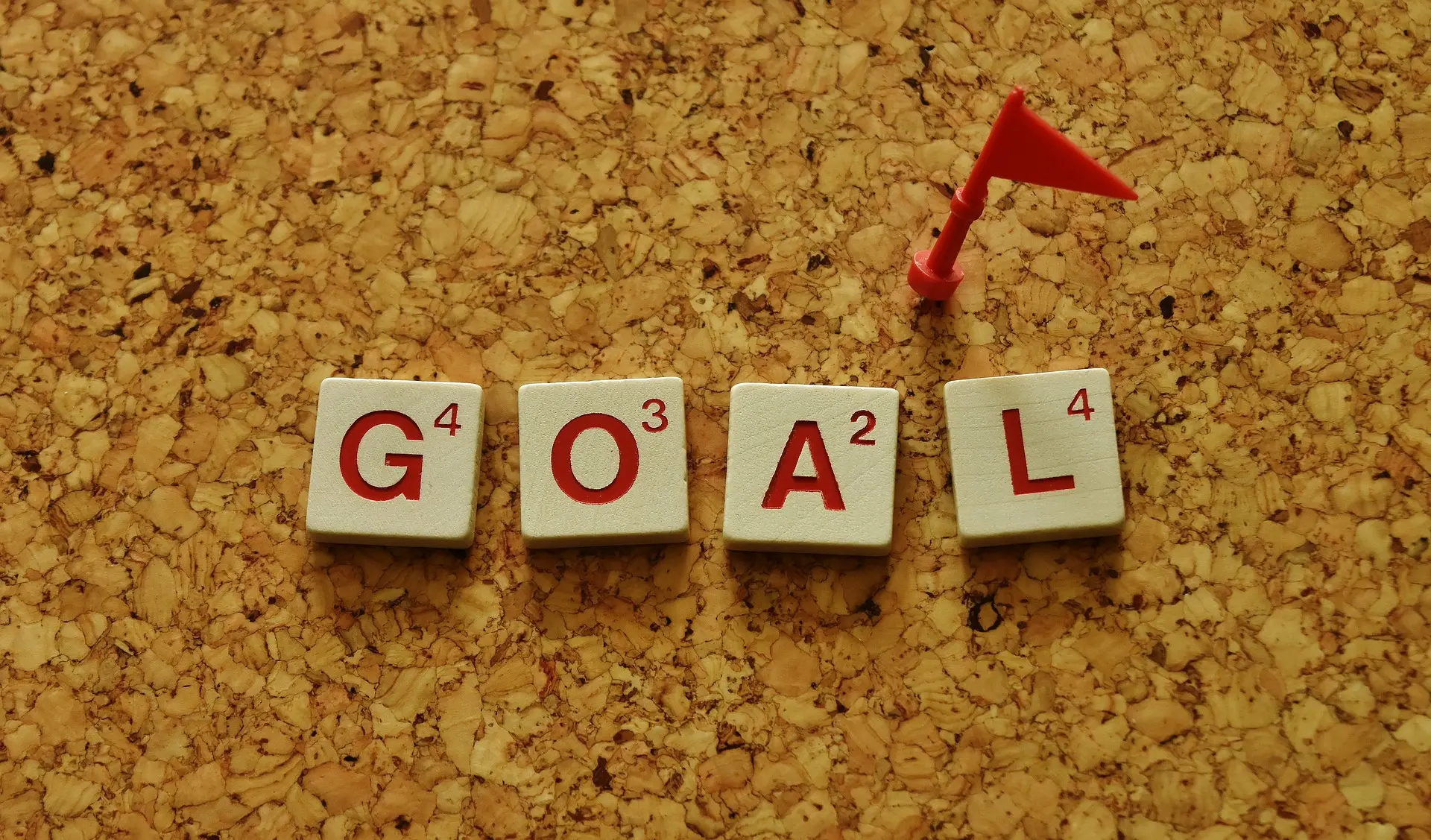 Scramble letters showing the word, GOAL